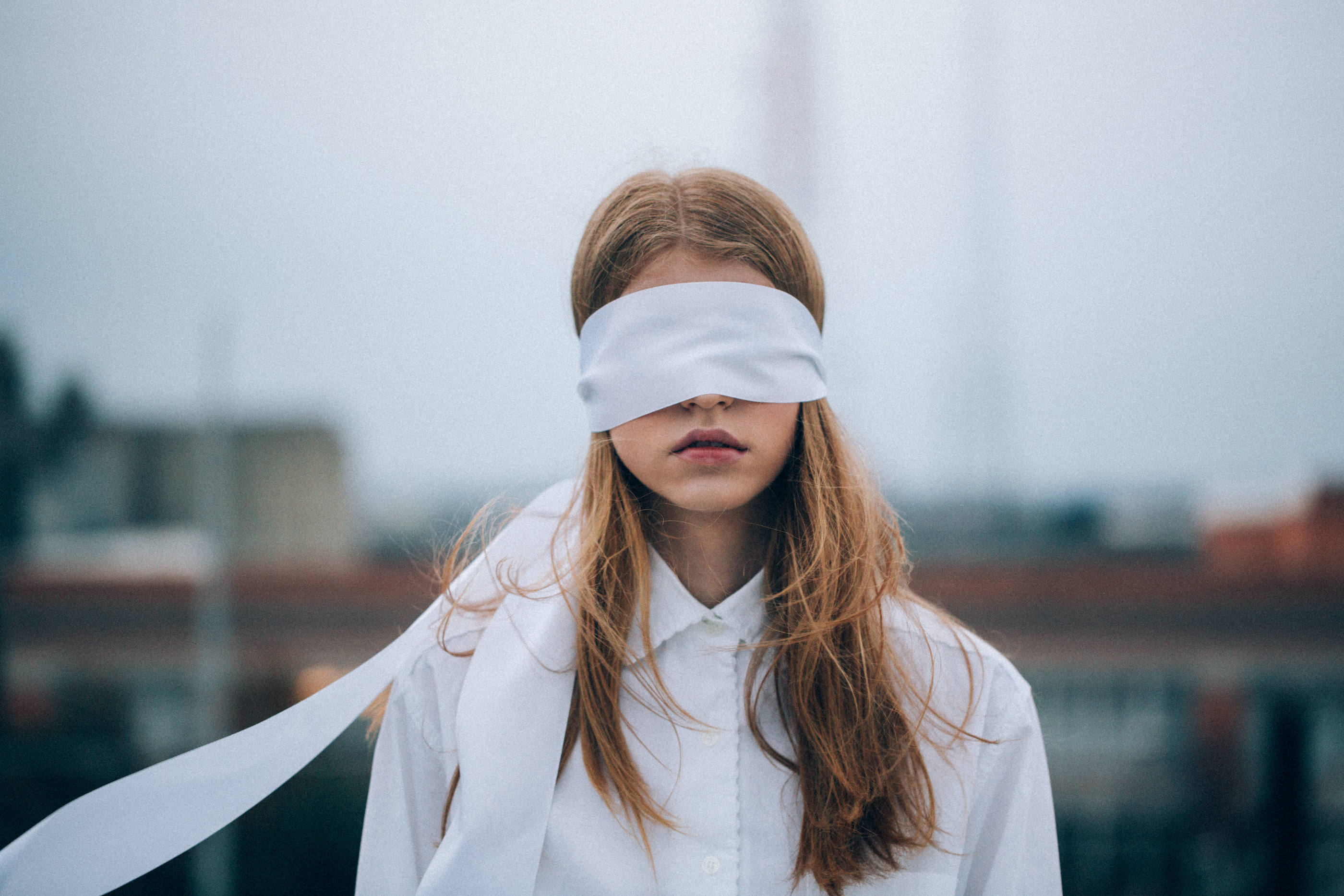 Blindfolded redhead