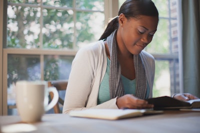 African American Woman Studying Bible