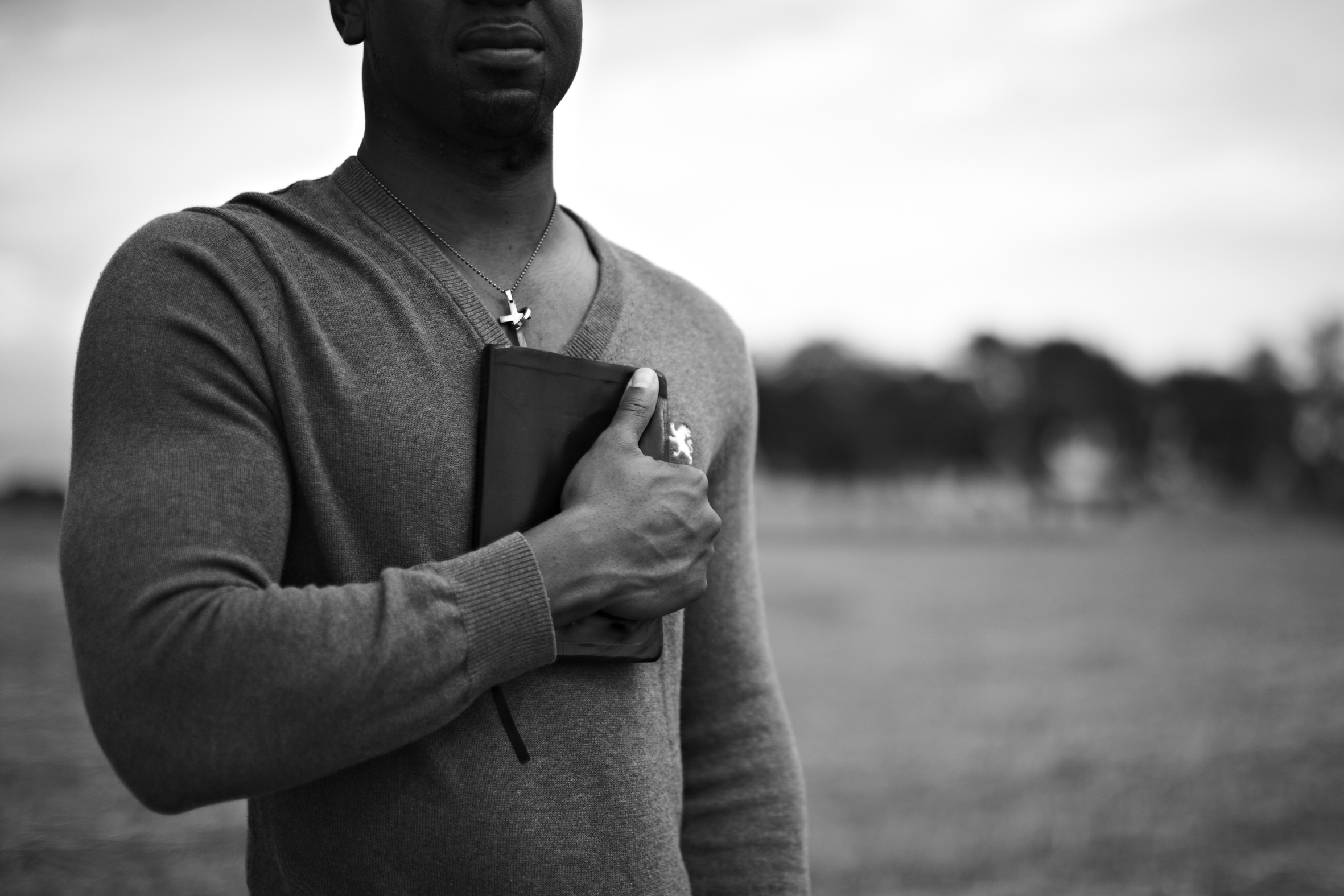 Man Holding Bible