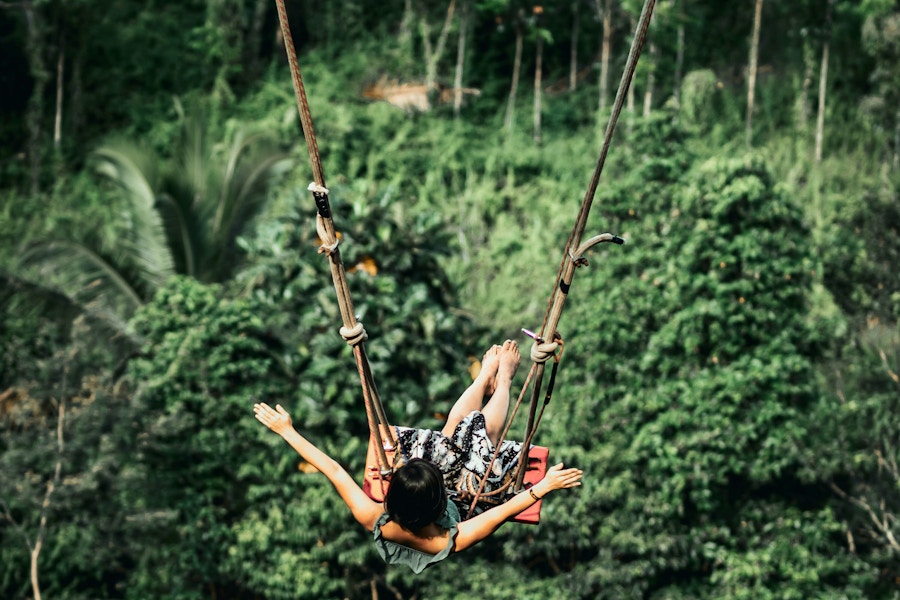 Woman swing jungle