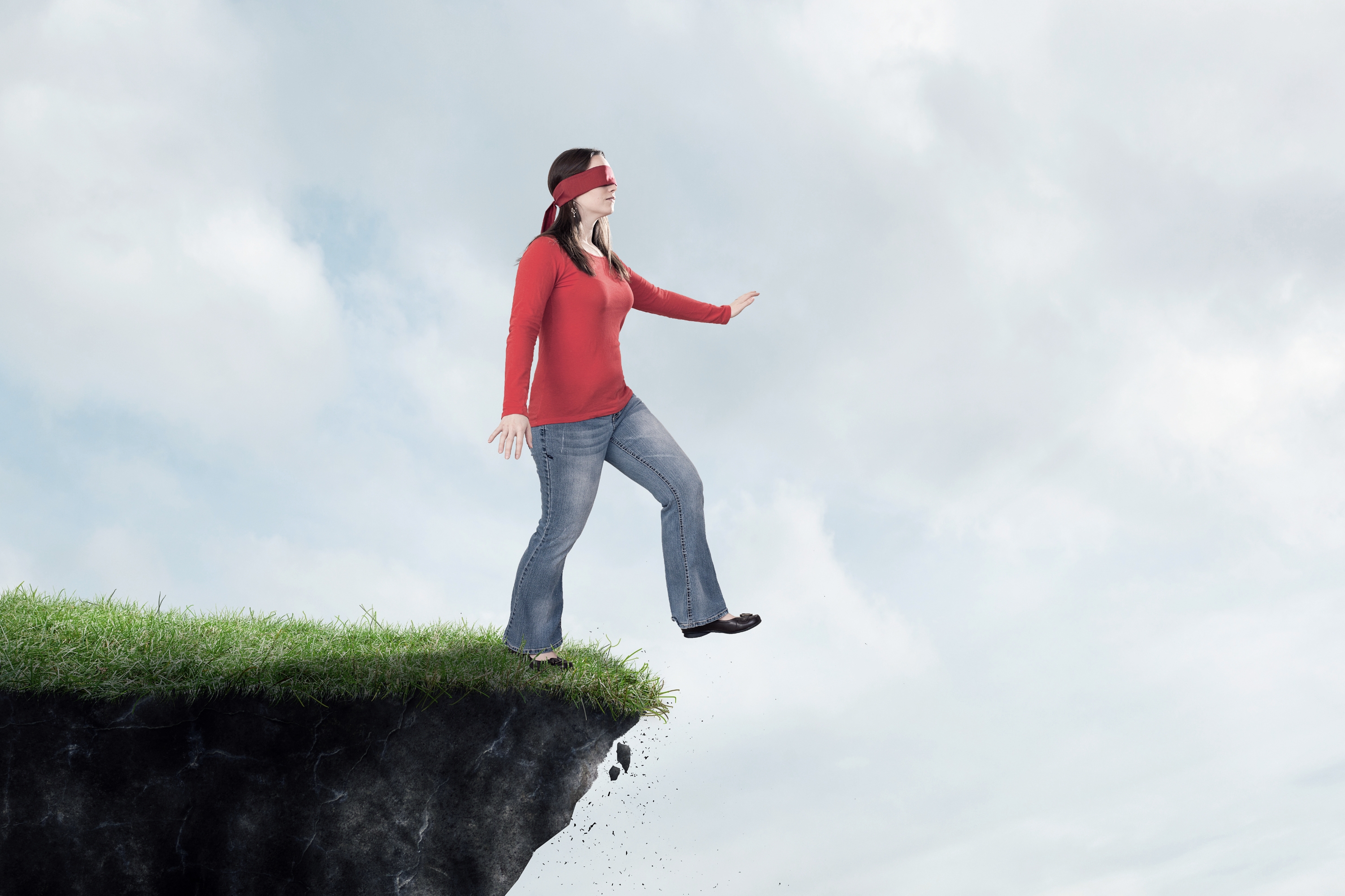 Woman Walking Off Cliff Blindfolded